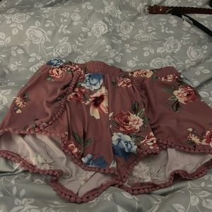 I’m selling these Medium floral shorts